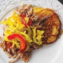 Pulled Pork with hot vinegar sauce, chow chow and corn pancakes